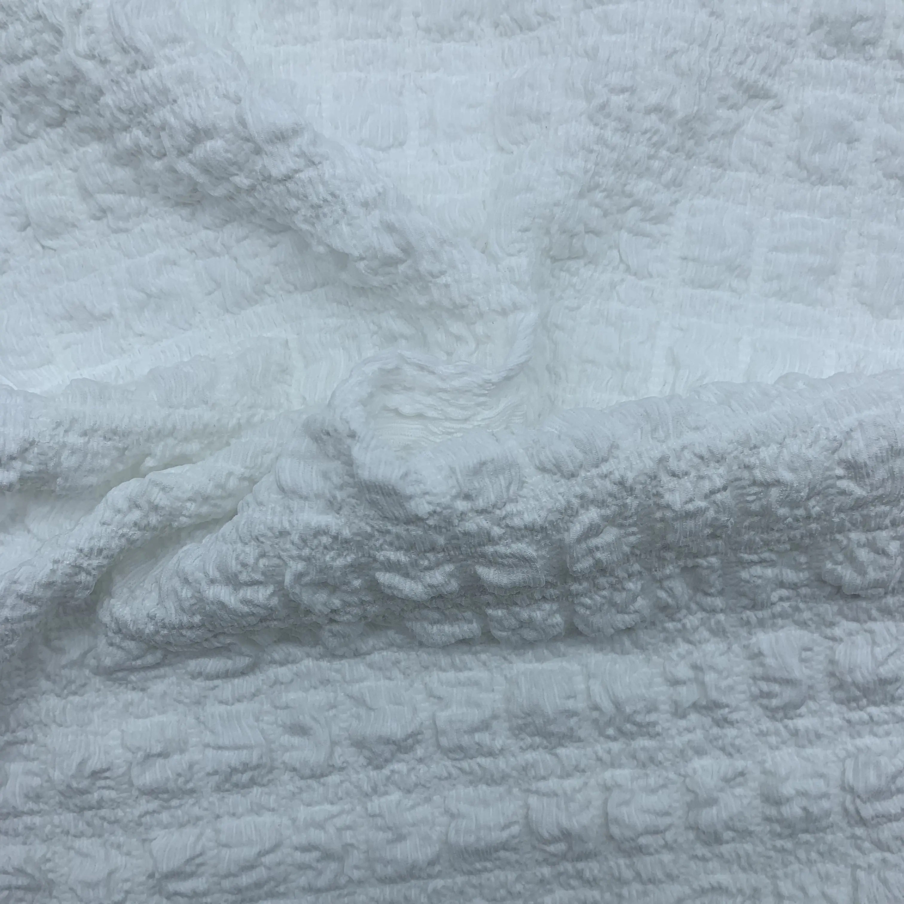Bubble crepe fabric full view – textured pebbled surface and soft drape