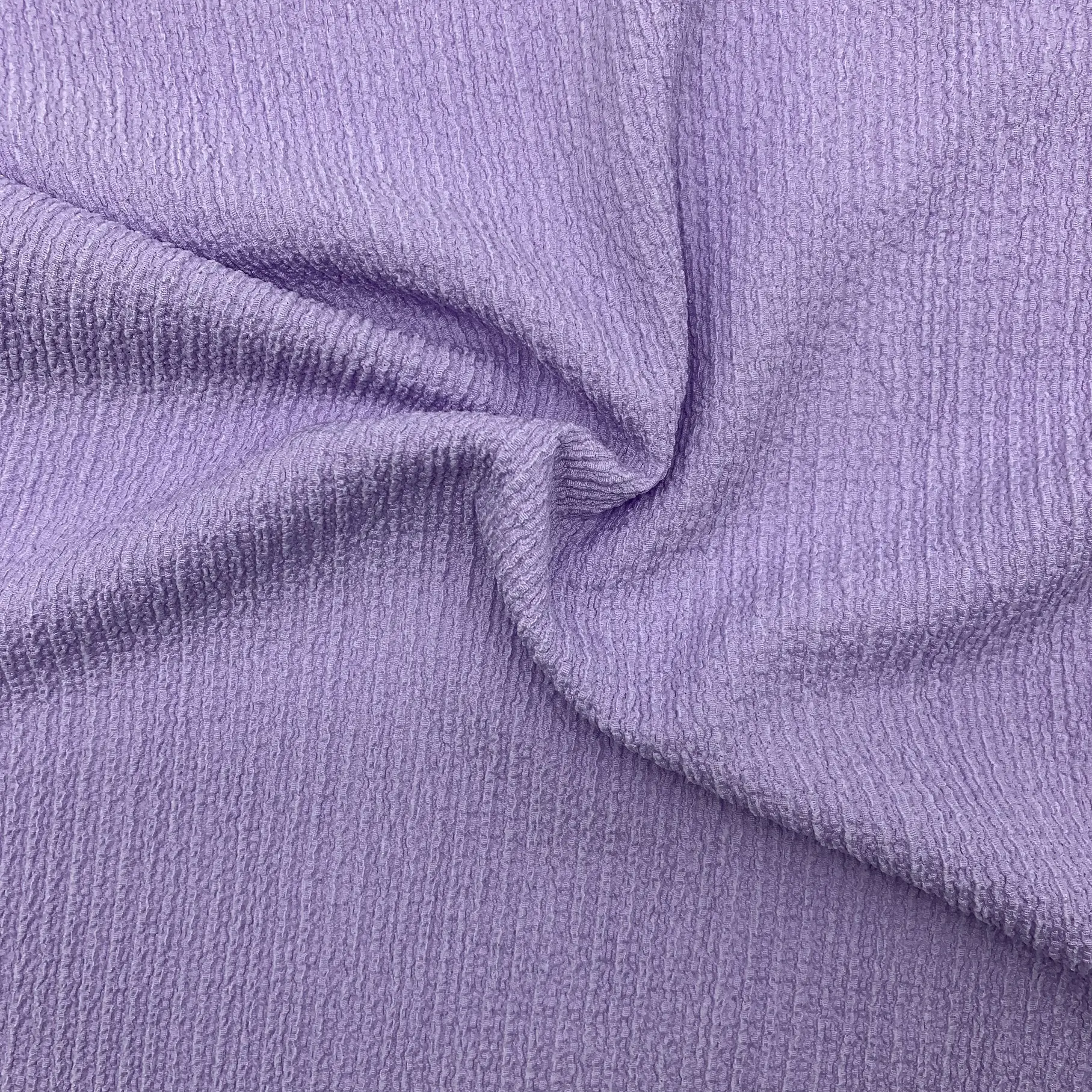 Lavender crepe fabric full view – soft crinkled texture and elegant drape