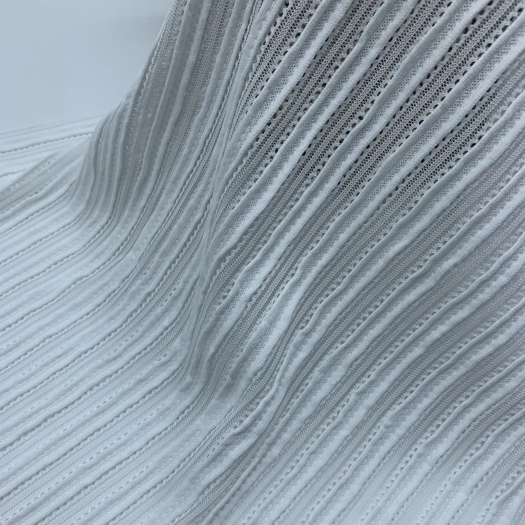 Hollow out crepe fabric full view – ribbed texture and breathable design